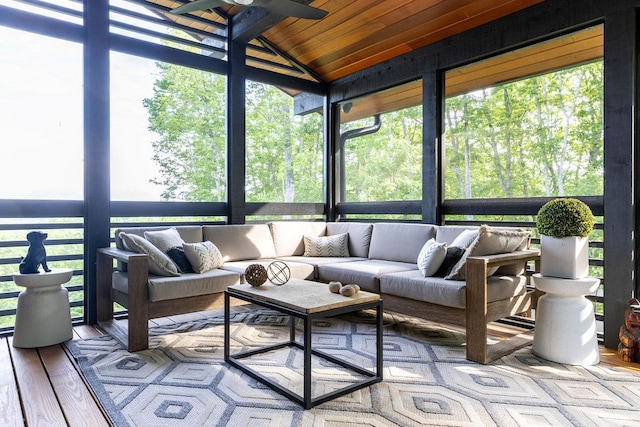 sunroom with a wealth of natural light, ceiling fan, lofted ceiling, and wood ceiling