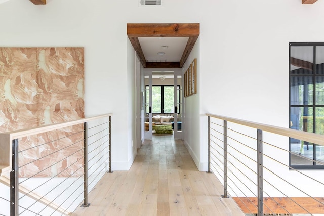 corridor featuring light hardwood / wood-style floors