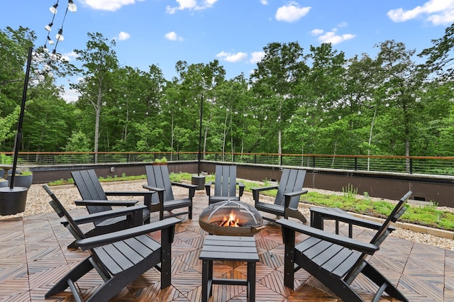 view of patio featuring a fire pit