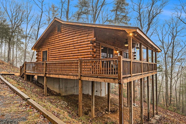 view of side of home featuring a deck