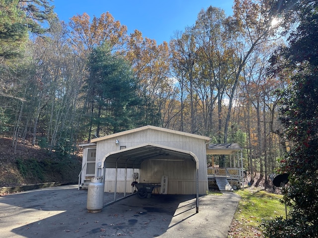 exterior space with a carport