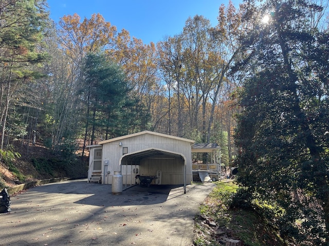 exterior space featuring a carport