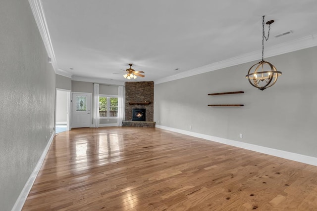 1647-8H Lakeview Dr, Young Harris, GA 30582 - unfurnished living room with crown molding, wood-type flooring, and ceiling fan with notable chandelier