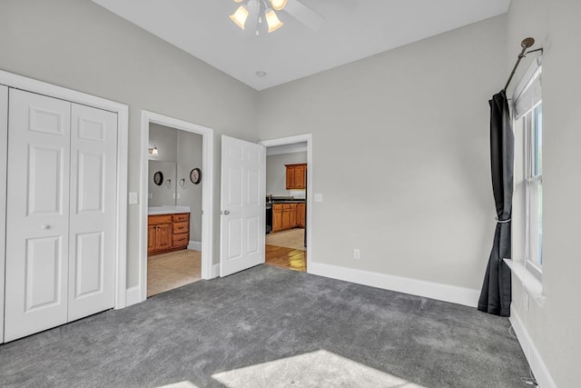 1647-8H Lakeview Dr, Young Harris, GA 30582 - unfurnished bedroom with a closet, baseboards, ensuite bathroom, and carpet flooring