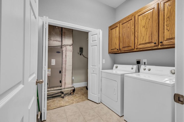 1647-8H Lakeview Dr, Young Harris, GA 30582 - laundry room with cabinet space, separate washer and dryer, and light tile patterned flooring