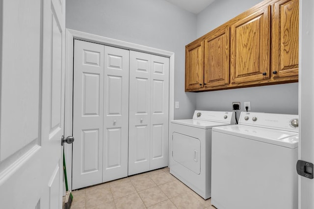 1647-8H Lakeview Dr, Young Harris, GA 30582 - laundry area with cabinet space, independent washer and dryer, and light tile patterned floors
