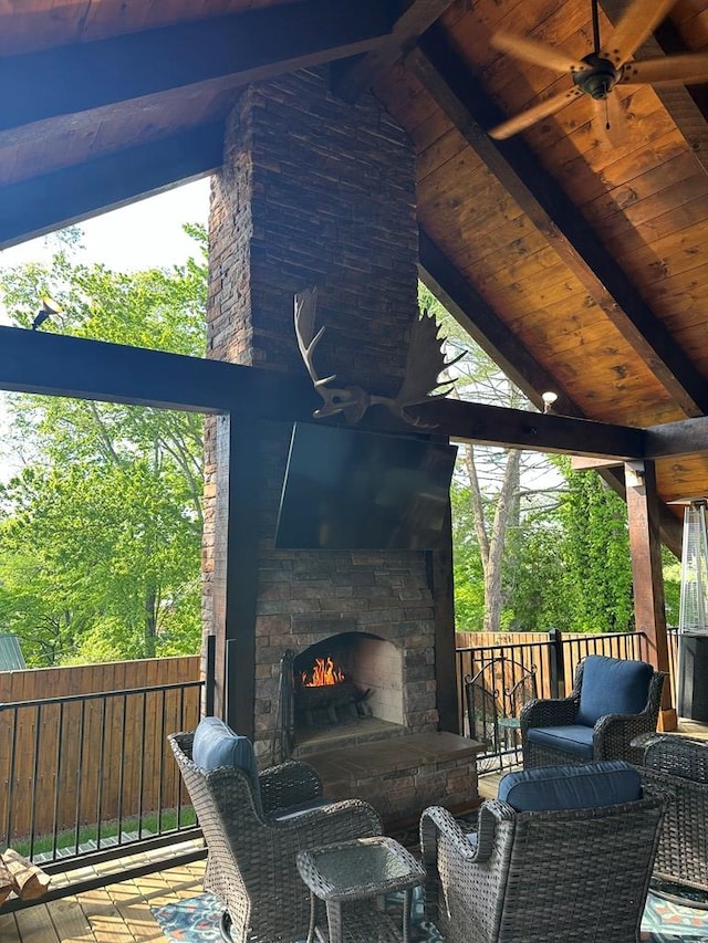 610 E Second St, Blue Ridge, GA 30513 - view of patio featuring a ceiling fan and an outdoor living space with a fireplace