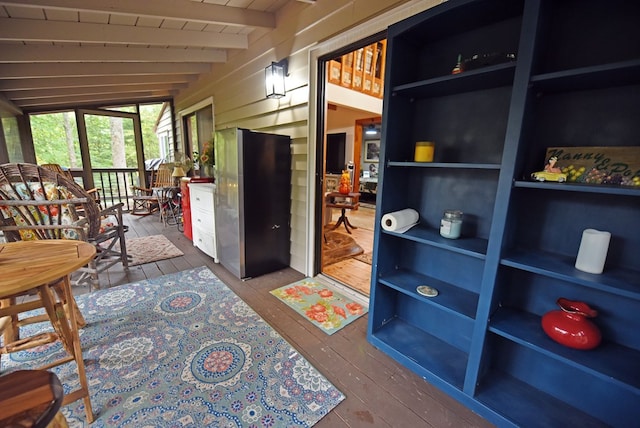 interior space featuring beamed ceiling