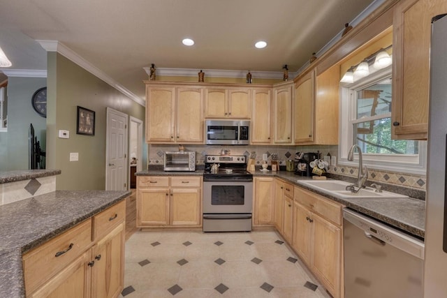 kitchen featuring ornamental molding, appliances with stainless steel finishes, light brown cabinetry, and sink