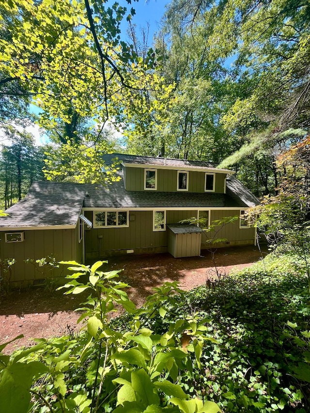 rear view of house featuring a patio