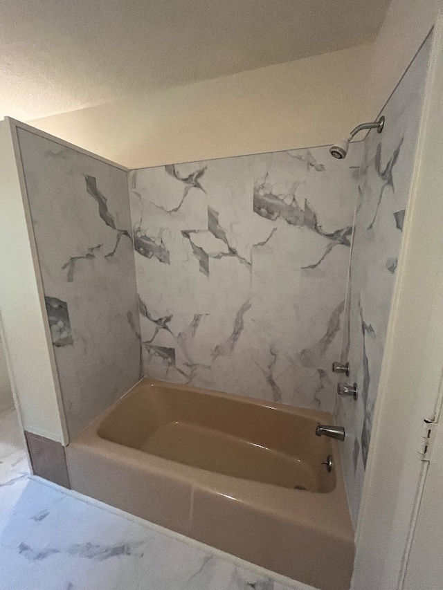 bathroom with tub / shower combination