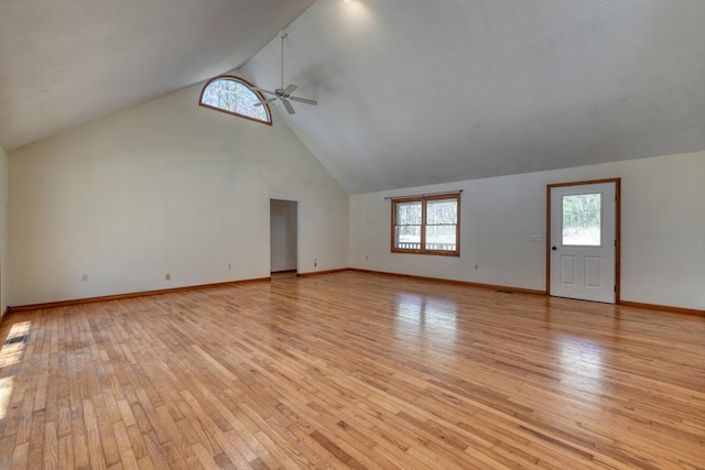 bonus room with baseboards, high vaulted ceiling, light wood-type flooring, and a ceiling fan