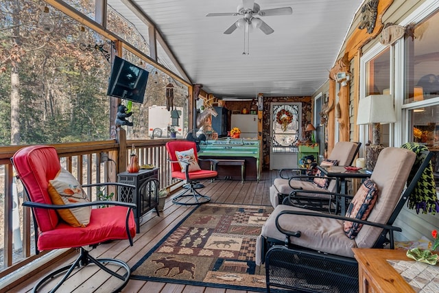 wooden deck with ceiling fan