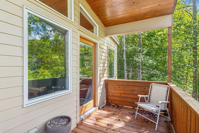 sunroom with wood ceiling