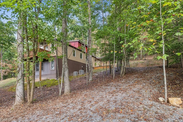 view of yard featuring central AC unit