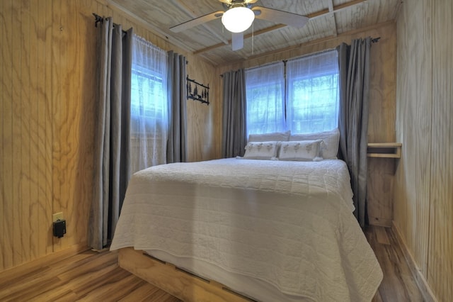 bedroom featuring ceiling fan and wood finished floors