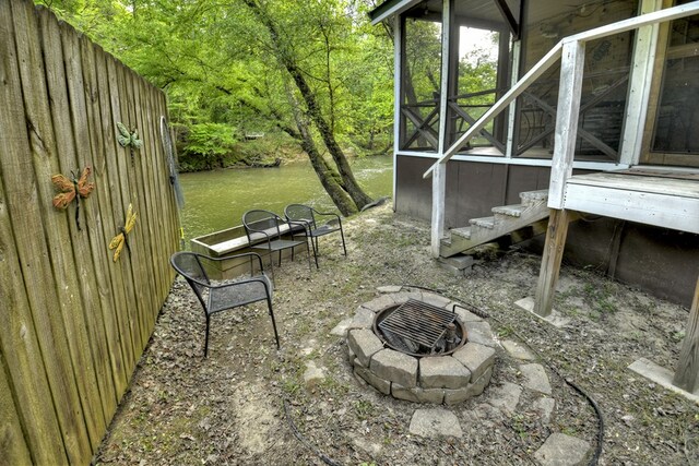 view of yard featuring a fire pit