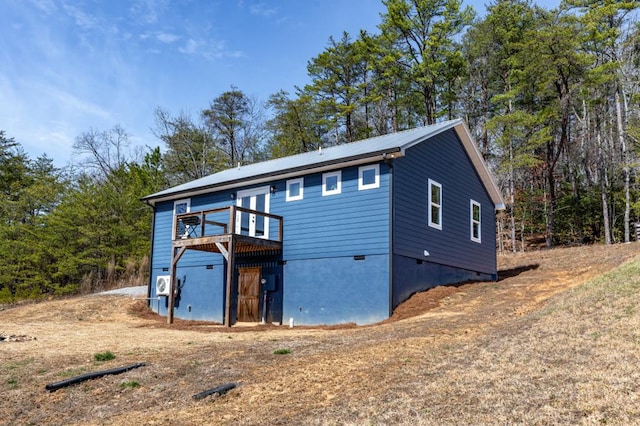 view of front of home featuring a wooden deck