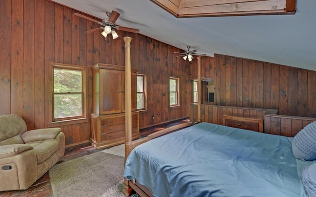 469 Hidden Valley Dr, Morganton, GA 30560 - bedroom with wooden walls, lofted ceiling, wood finished floors, and ceiling fan