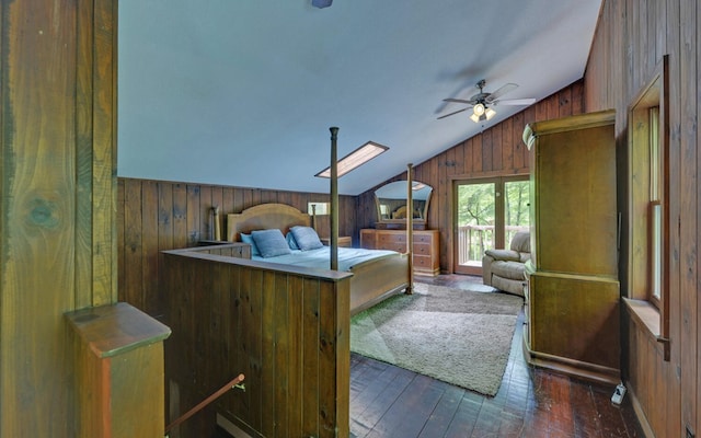 469 Hidden Valley Dr, Morganton, GA 30560 - bedroom featuring lofted ceiling, wooden walls, and dark wood-style floors