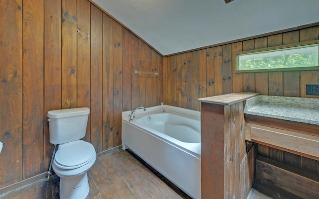 469 Hidden Valley Dr, Morganton, GA 30560 - full bathroom with a garden tub, toilet, wood walls, and baseboards