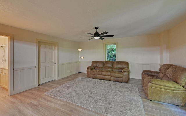 469 Hidden Valley Dr, Morganton, GA 30560 - living area featuring wainscoting, ceiling fan, and light wood finished floors