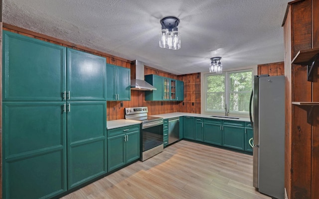 469 Hidden Valley Dr, Morganton, GA 30560 - kitchen with stainless steel appliances, wall chimney range hood, green cabinetry, a sink, and a textured ceiling