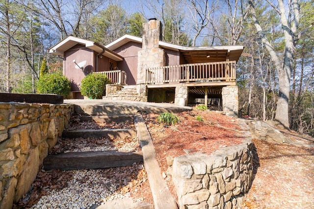 exterior space featuring a wooden deck