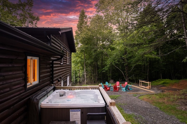 exterior space featuring a hot tub