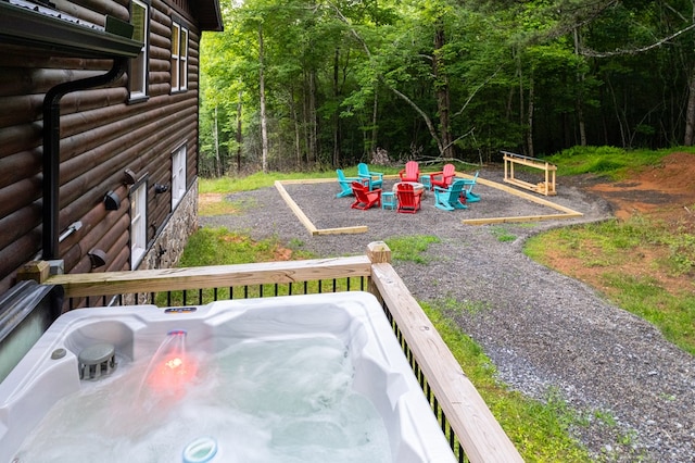 view of yard with an outdoor fire pit