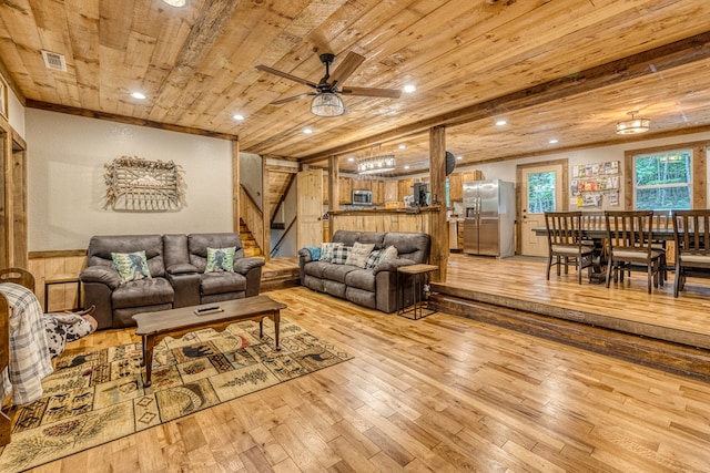 living room featuring wood finished floors, visible vents, recessed lighting, stairs, and wooden ceiling