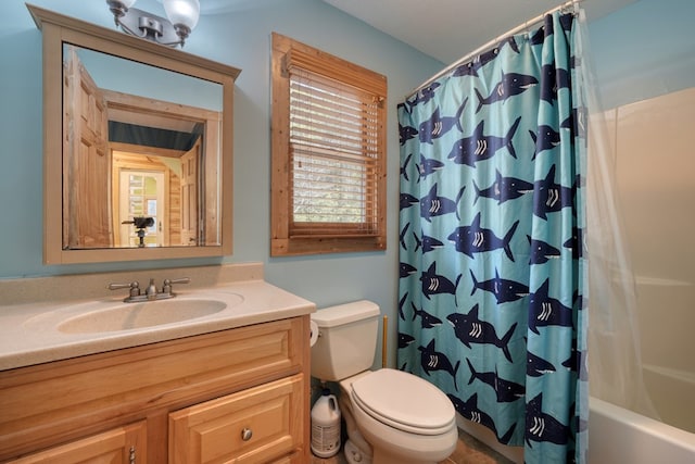 full bath with toilet, vanity, and shower / bathtub combination with curtain