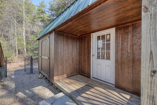 property entrance featuring metal roof