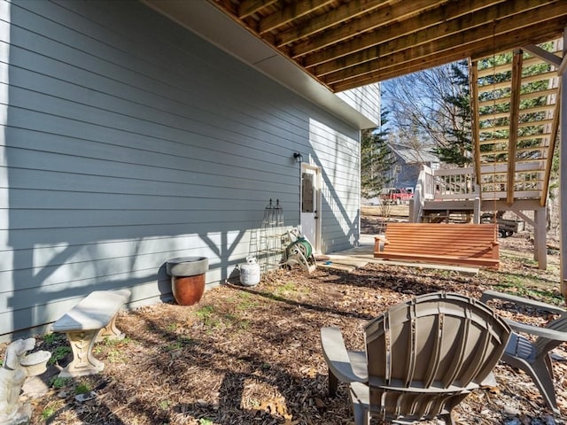 view of yard with a wooden deck