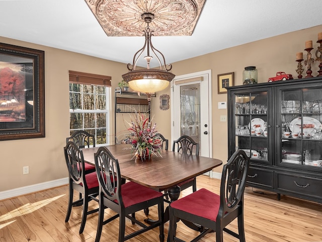 dining space featuring light hardwood / wood-style floors