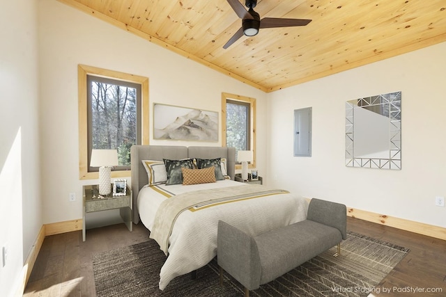 bedroom featuring vaulted ceiling, multiple windows, wooden ceiling, and wood finished floors