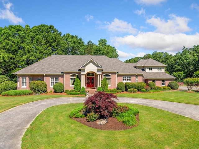 226 Euharlee Five Forks Rd, Kingston, GA 30145 - view of front of property with curved driveway, a front lawn, and brick siding
