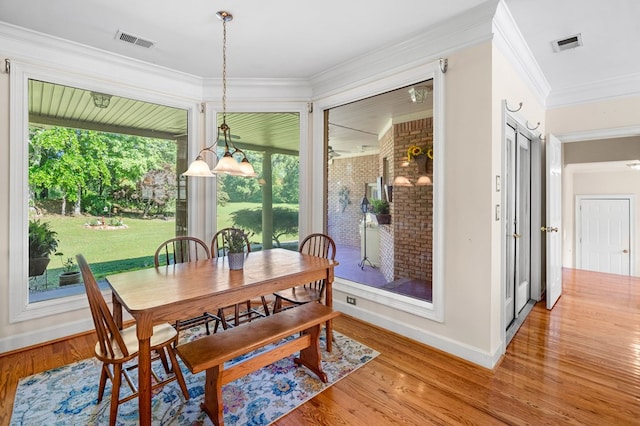 226 Euharlee Five Forks Rd, Kingston, GA 30145 - dining area with baseboards, wood finished floors, and crown molding