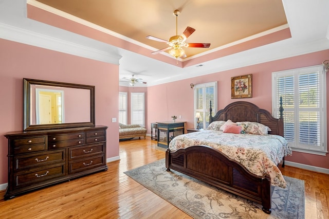 226 Euharlee Five Forks Rd, Kingston, GA 30145 - bedroom featuring a raised ceiling, crown molding, light wood-type flooring, baseboards, and ceiling fan