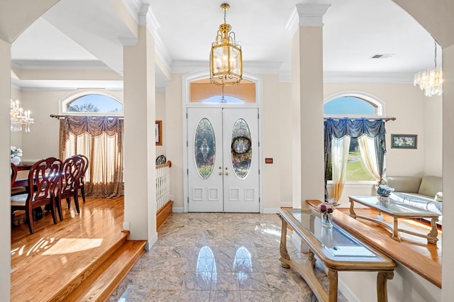 226 Euharlee Five Forks Rd, Kingston, GA 30145 - entrance foyer featuring a chandelier, crown molding, plenty of natural light, arched walkways, and baseboards