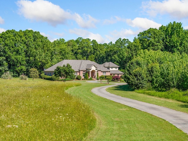 226 Euharlee Five Forks Rd, Kingston, GA 30145 - view of front of home with a front lawn and a forest view