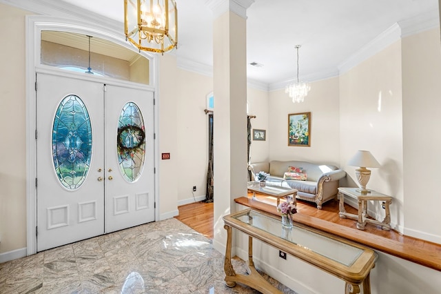 226 Euharlee Five Forks Rd, Kingston, GA 30145 - foyer entrance with a chandelier, ornamental molding, baseboards, ornate columns, and french doors