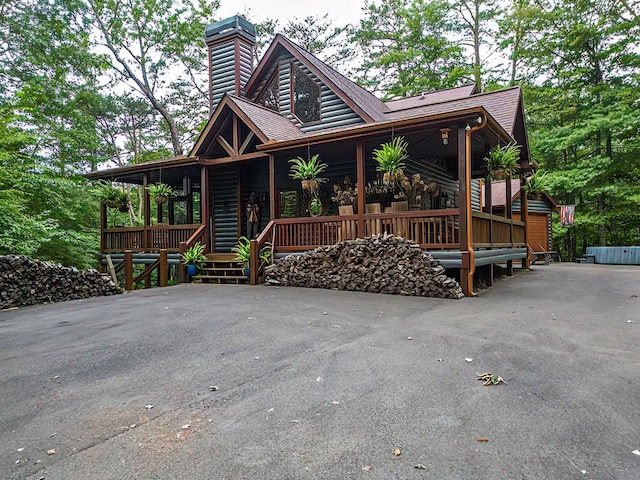 view of front of home featuring covered porch