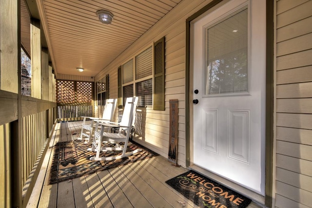 wooden terrace with covered porch