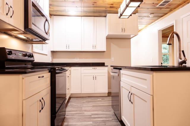 61 Morningside Ct, Ellijay, GA 30540 - kitchen with stainless steel appliances, wooden ceiling, healthy amount of natural light, light wood-type flooring, and dark countertops