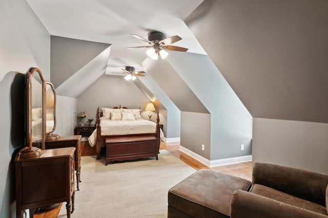 bedroom with ceiling fan and vaulted ceiling