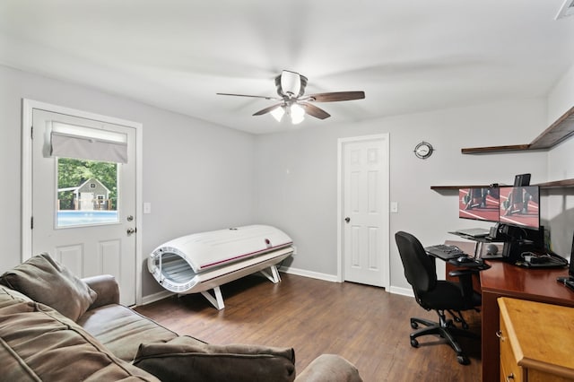 office with ceiling fan and dark wood-type flooring