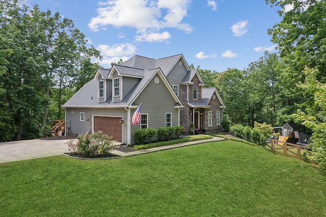 craftsman inspired home with a garage and a front lawn