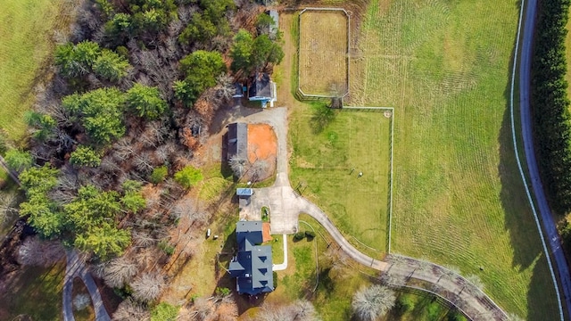 birds eye view of property featuring a rural view