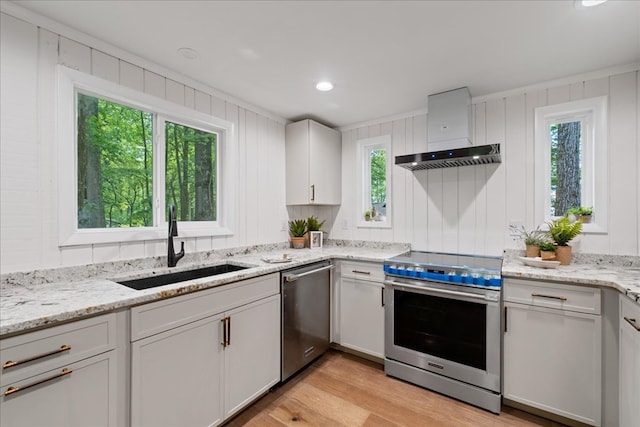 1220 Walnut Rdg, Ellijay, GA 30536 - kitchen with appliances with stainless steel finishes, range hood, a sink, and plenty of natural light